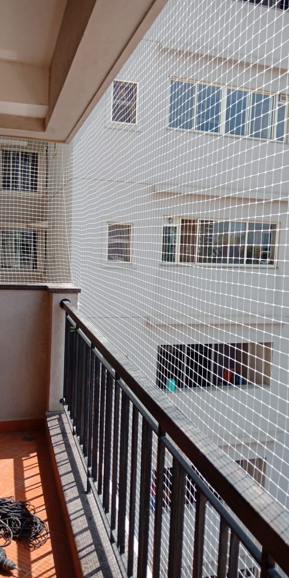 Balcony pigeon net installation